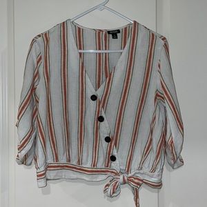 Quarter sleeve, cropped shirt. Blue, yellow, and orange shades of stripes.